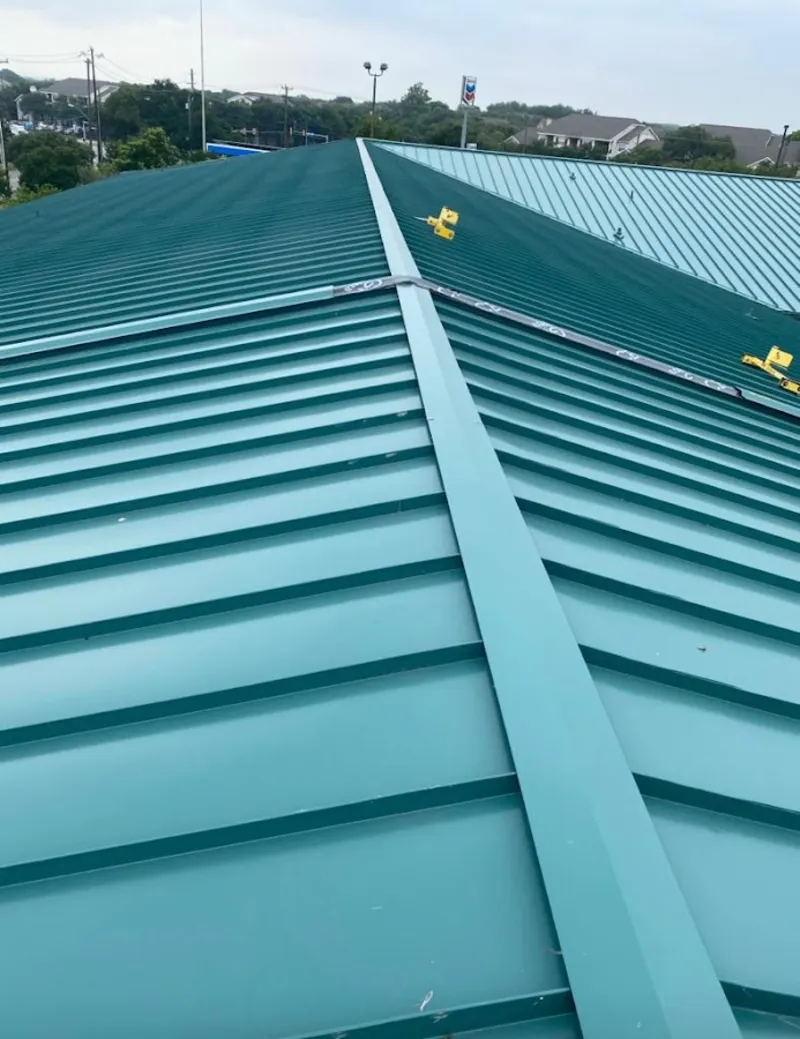 Green commercial metal roof ridge and valley for Metal Roof Repair in Millstone